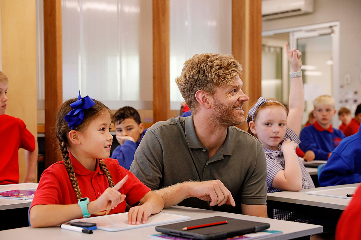 Student and teacher in classroom.